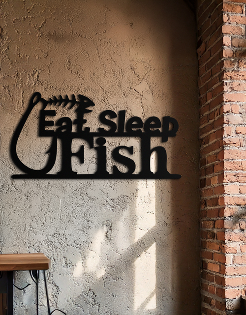 Load image into Gallery viewer, "Eat, Sleep, Fish" Metal Wall Art – Fishing Enthusiast Design with Hook and Phrase- KAF670